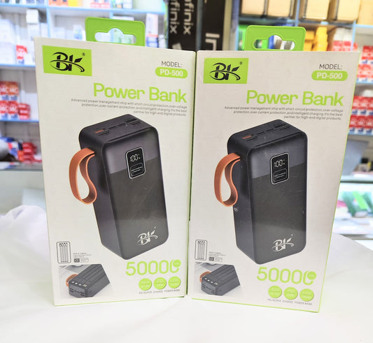 Two packages of a power bank with a visible brand logo on a store shelf background.